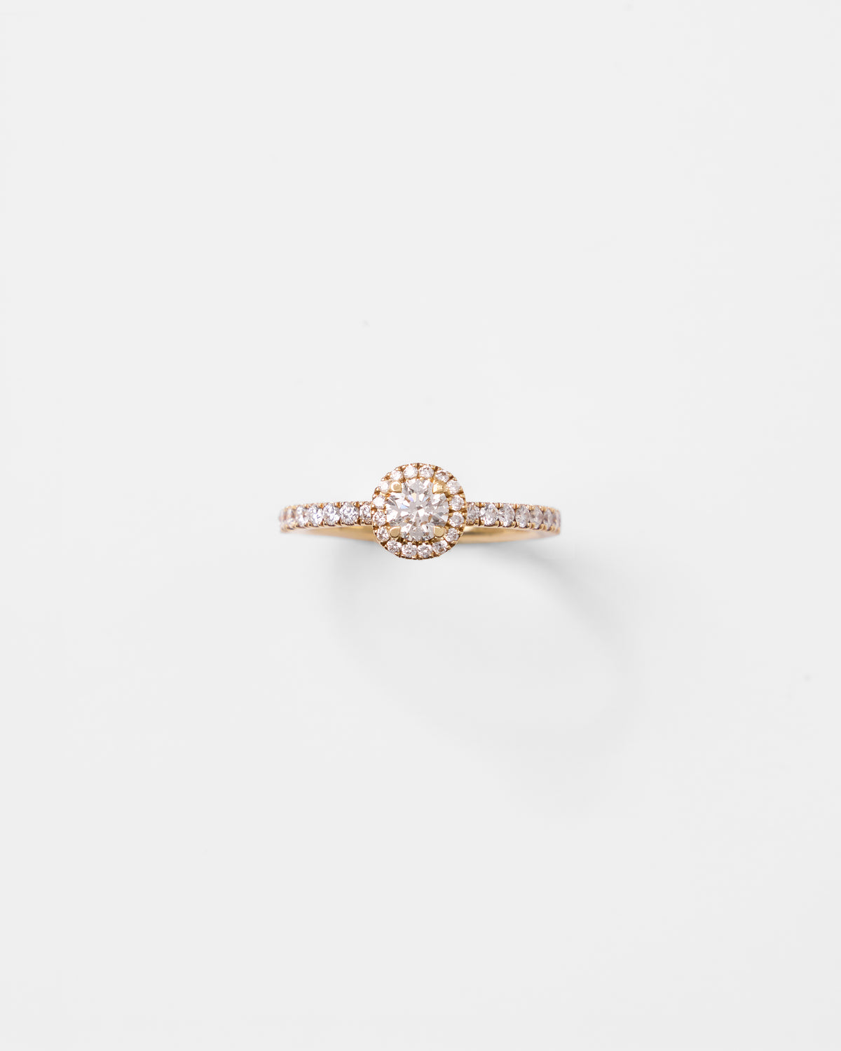 Bague solitaire en or jaune et diamant rond