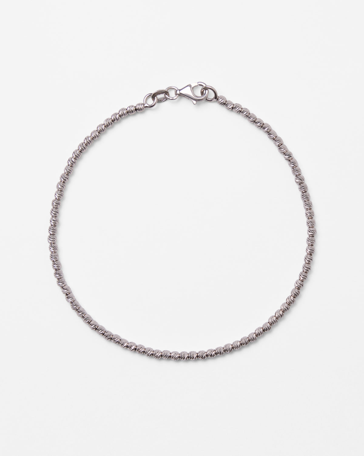 Bracelet en or blanc et boules martelées