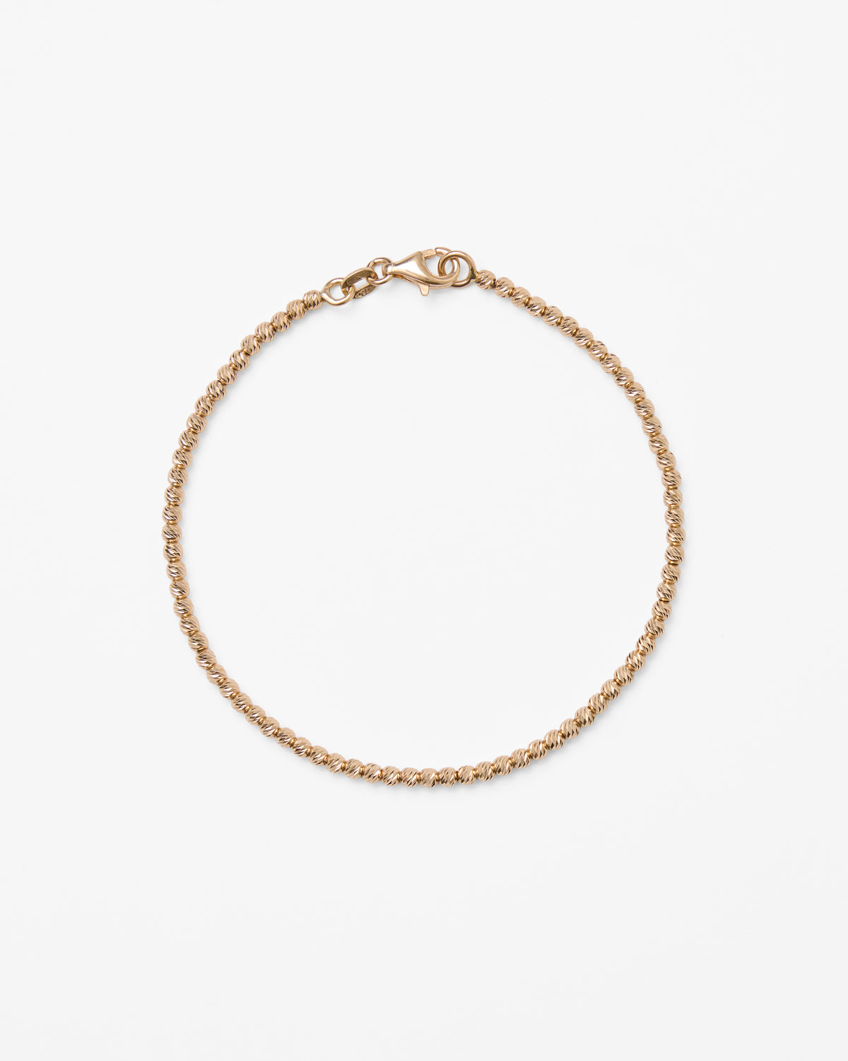 Bracelet en or blanc et boules martelées