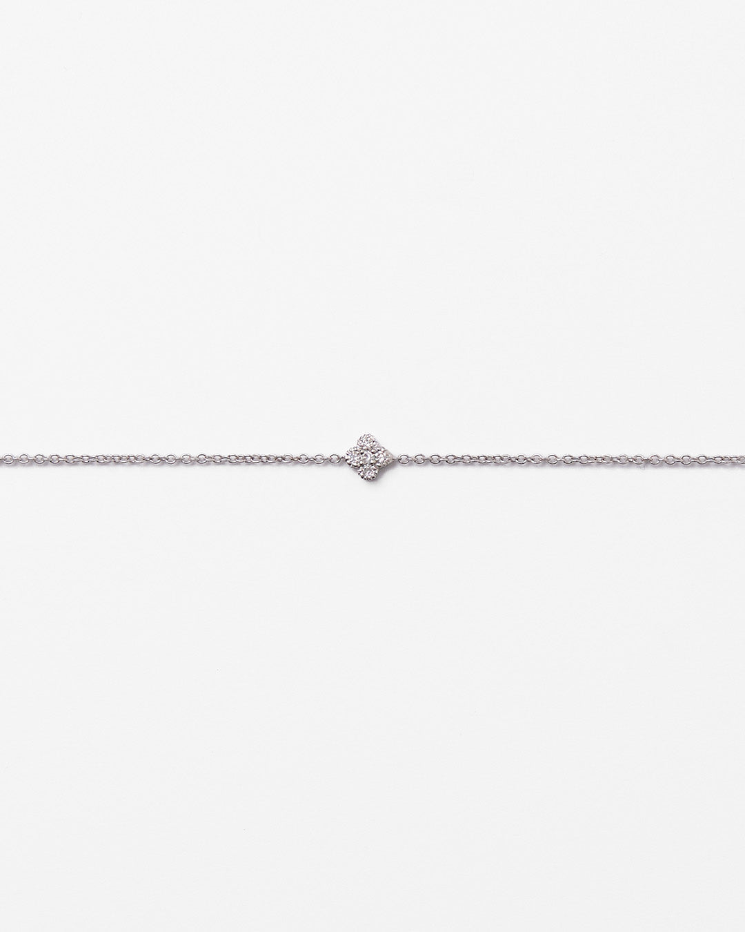 Bracelet en or blanc et trèfle serti diamants